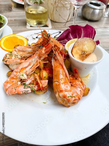 fried prawns on a plate in the restaurant