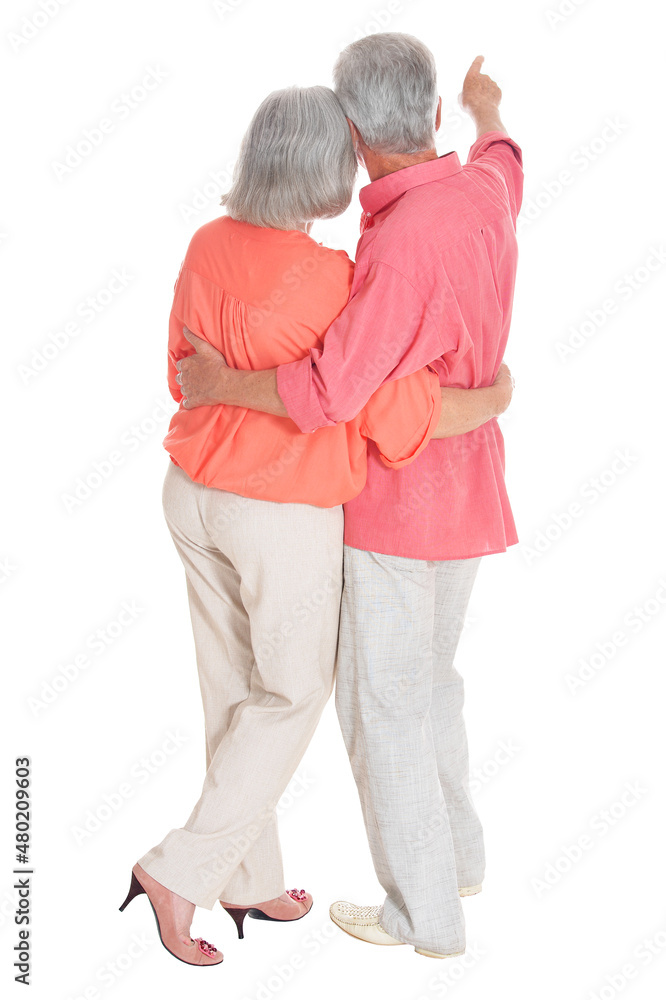 Perfect old couple posing on a white background, back view Perfect old couple posing on a white background, back view