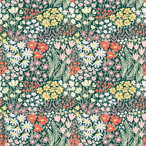 Ditsy floral  seamless pattern. Many various Flowers on green background. Full Summer Meadow Wildflower texture. Liberty style motif for fashion print, textile, fabric, cover, wrap, gift paper