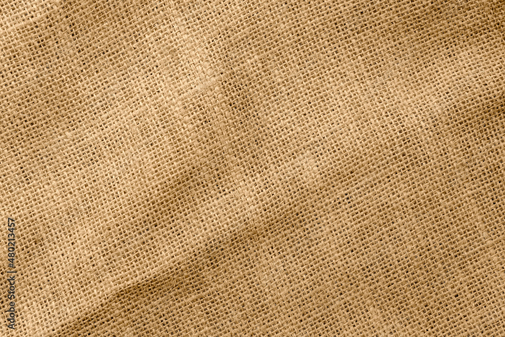 Seamless brown sackcloth fabric close up view for texture background Seamless brown sackcloth fabric close up view for texture background