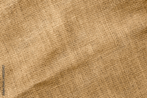 Seamless brown sackcloth fabric close up view for texture background