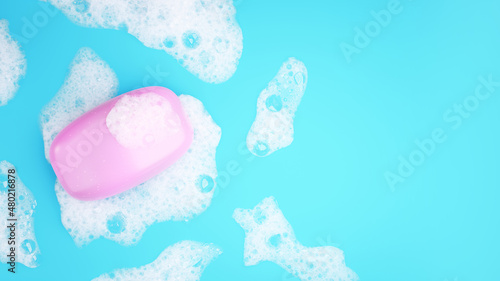 Pink soap bar with white foam on blue background. Higien or cleaning concept. 3D render image.