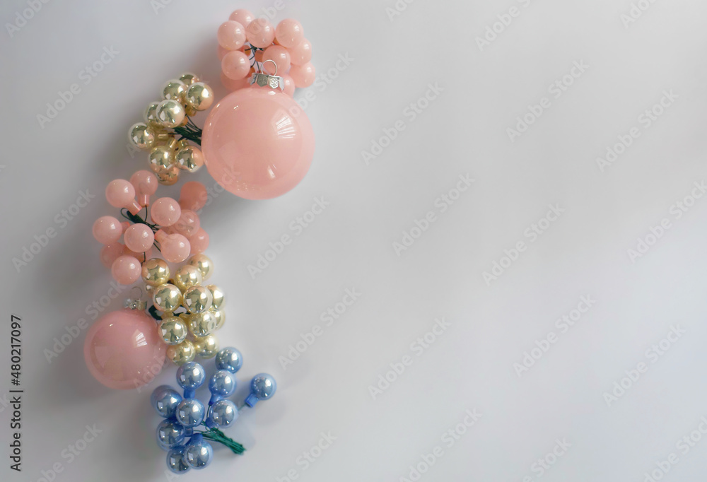 Christmas round toys on a white table. different colors Christmas round toys on a white table. different colors