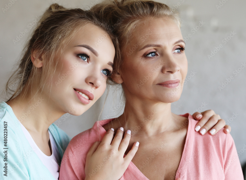 lifestyle, family and people concept: Happy young woman and her mother at home lifestyle, family and people concept: Happy young woman and her mother at home