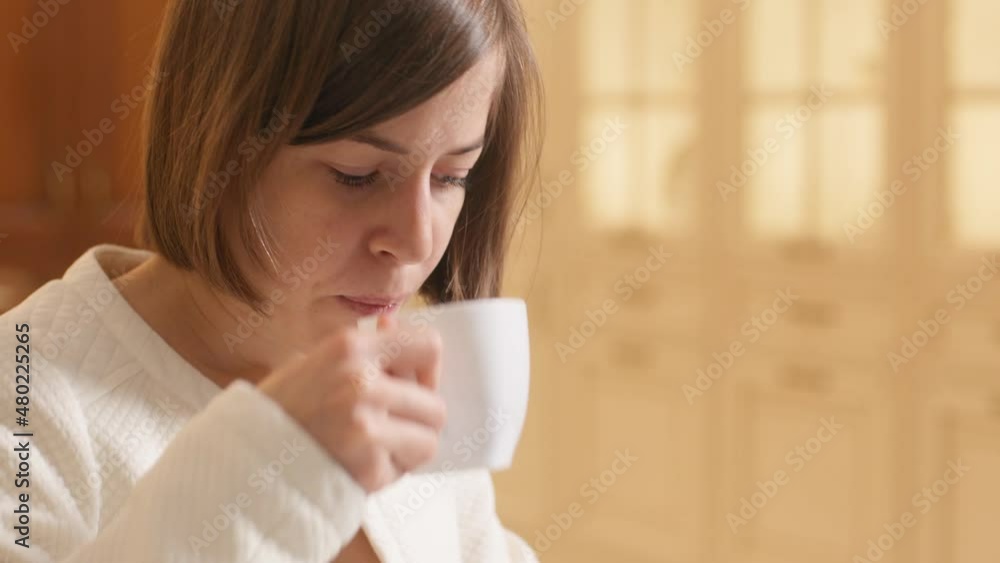 Business Woman Smartphone In Hands Looking At Cellphone Screen, Drinking Coffee. Businesswoman Surfing Social Media Networks, Checking News On Mobile Smart Phone. Girl Freelancer Chatting Friends.