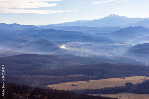 winter mountain landscape on a sunny day, with no snow cover, on observation decks.