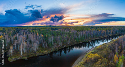 Fototapeta Naklejka Na Ścianę i Meble -  beautiful sunset in the taiga with a river
