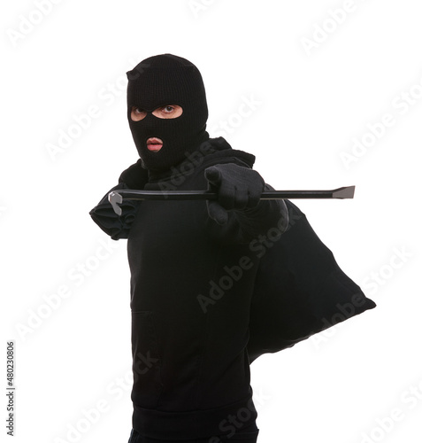 Thief in mask with crowbar and bag on white background