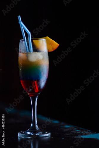 Tasty cocktail with alcohol in low key on a dark background.