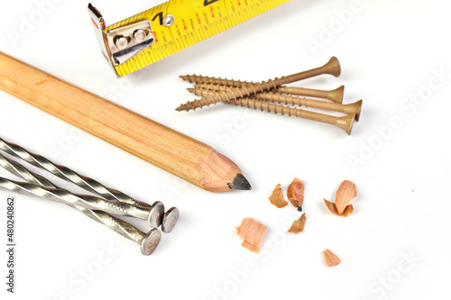Carpenter's Pencil with Sharpening Shavings, Tape Measure, Framing Nails and Deck Screws