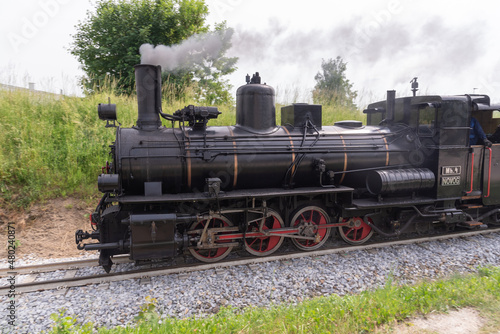 On a summer day a steam engine in Lower Austria steams to its destination.
