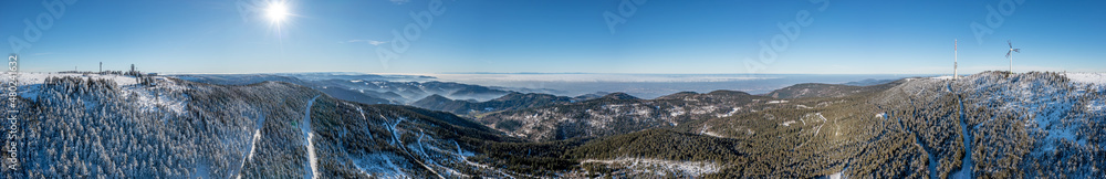 Obraz premium Drone panorama over Rhine valley near German town Baden Baden taken from Mummelsee in Black Forest