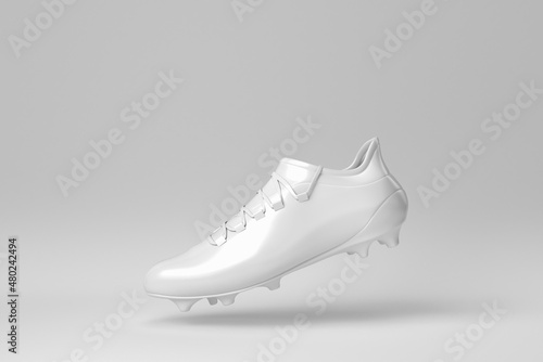 Fototapeta Naklejka Na Ścianę i Meble -  Footbal boots. Soccer boots on white background. minimal concept. 3D render.