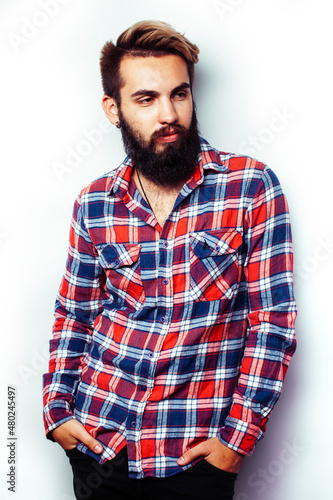 portrait of young bearded hipster guy smiling on white background close up isolated