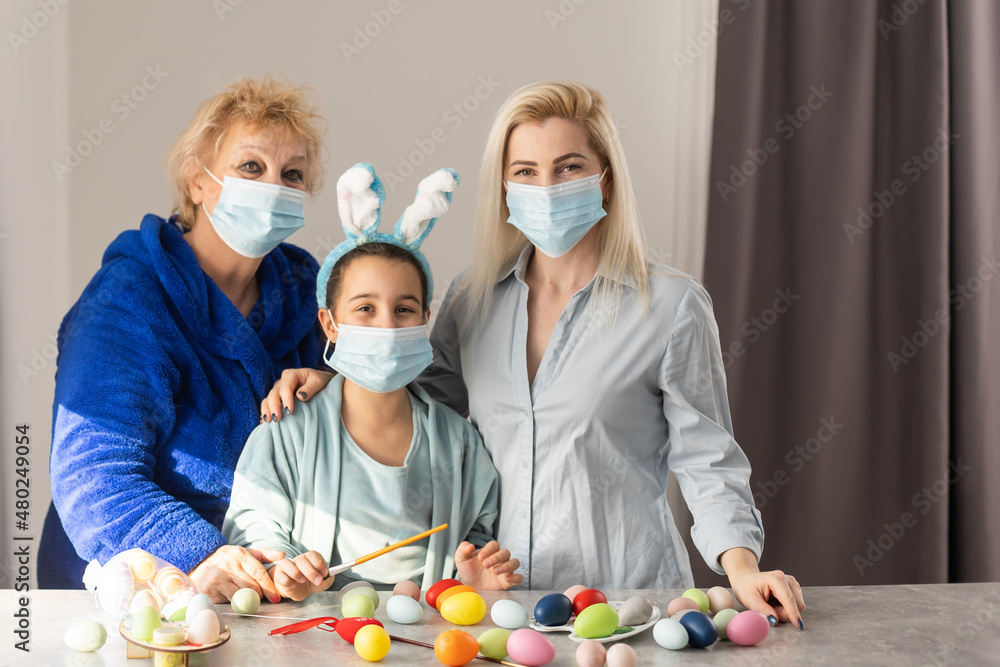 Family at home quarantine over Easter table
