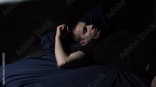Disturbed sleep. I have nightmares. The young guy tosses and turns in bed