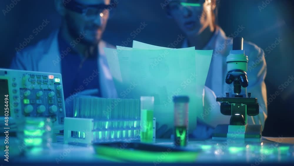 Scientists are analyzing samples in medical research laboratory. Scientific searching for vaccine with microscope to treat diseases in medicine. Pharmaceutical Lab and biotechnology development Scientists are analyzing samples in medical research laboratory. Scientific searching for vaccine with microscope to treat diseases in medicine. Pharmaceutical Lab and biotechnology development