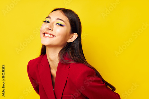 portrait pretty woman attractive look cosmetics red jacket studio model unaltered