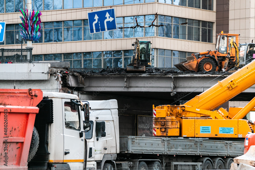 Minsk, Belarus - 01.08.2022. Repair of a destroyed bridge in the city. Dismantling the bridge.