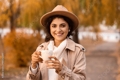 Beautiful woman drinking te...