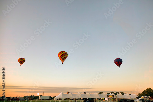 View of Many Hot Air Balloons Getting Ready to Take Off On An Early Morning Balloon Festival