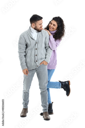 Happy young couple in warm ...