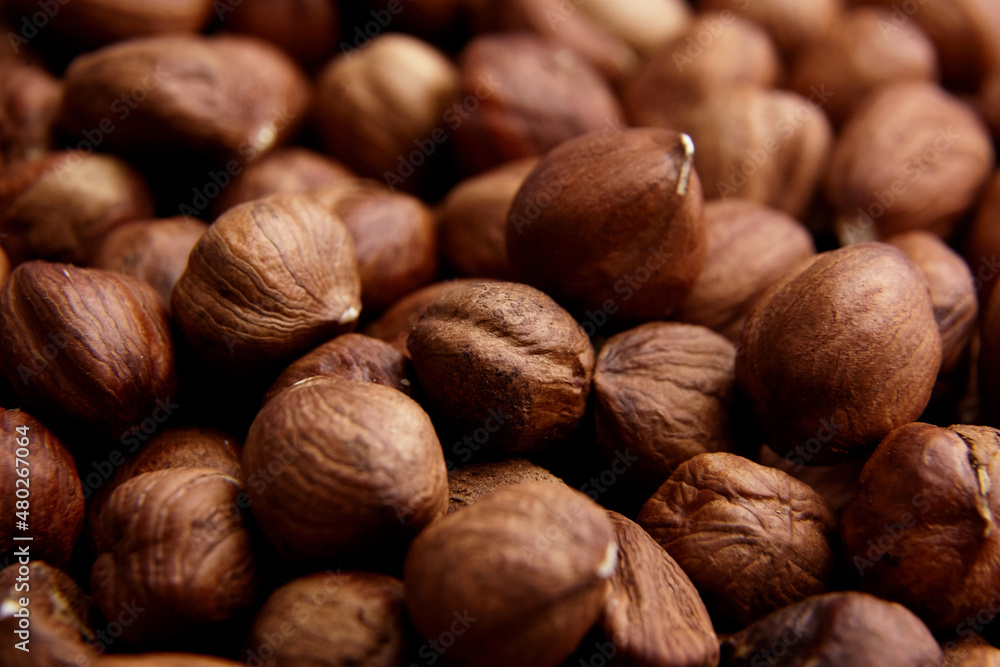 Shelled raw hazelnuts background closeup Shelled raw hazelnuts background closeup