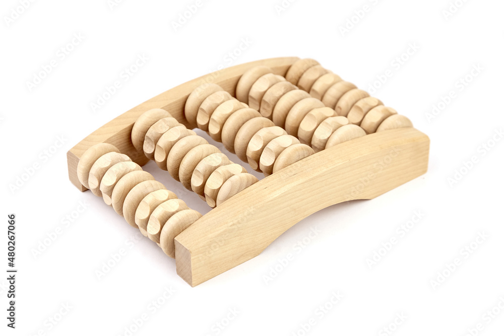 Wooden foot massage roller isolated on white Wooden foot massage roller isolated on white