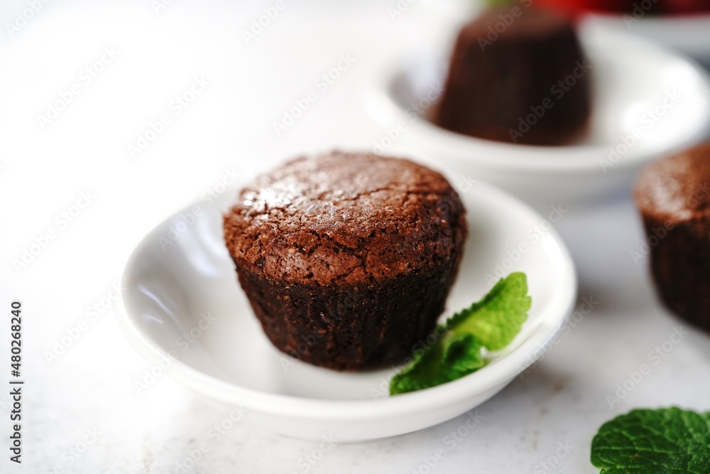 Homemade mini Chocolate Molten lava cake, selective focus Homemade mini Chocolate Molten lava cake, selective focus