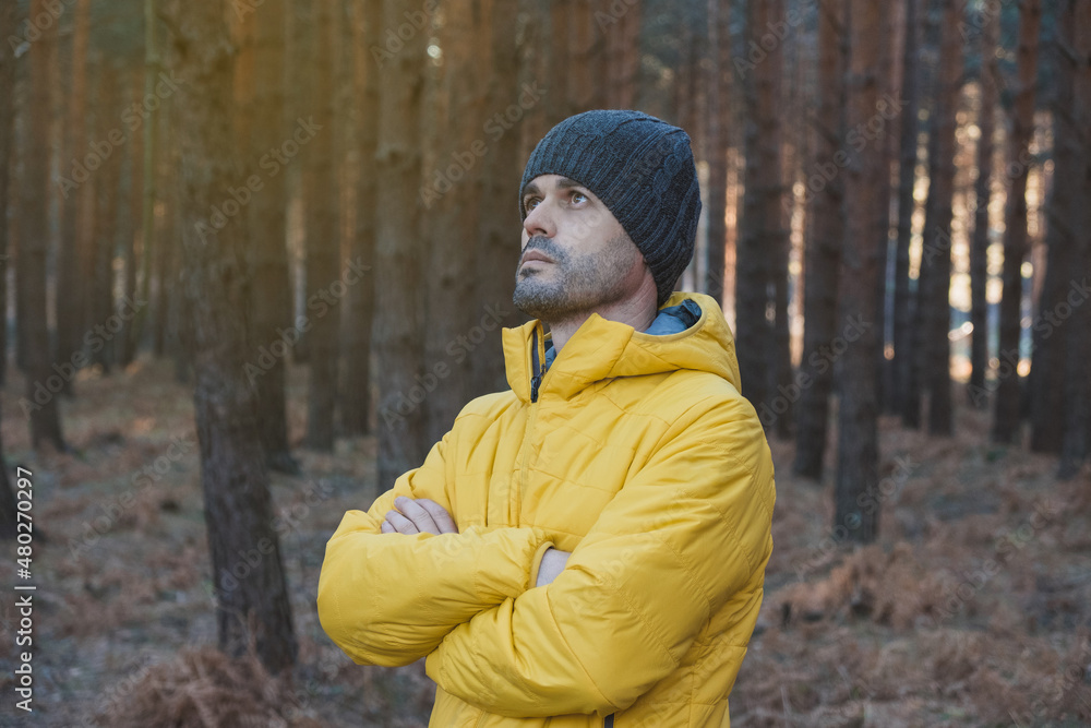 Lonely man thinking in the forest Lonely man thinking in the forest