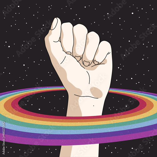 Fist up. Raised human hand. LGBT rights. Rainbow in space. Starry sky