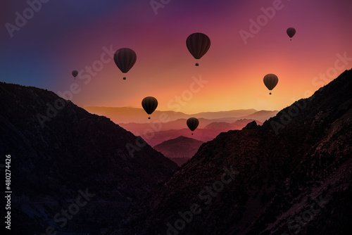 Hot Air Balloons In Mountain Peaks and Valleys at Sunset in Yosemite National Park