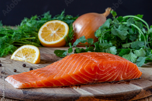 Salmon, lemons and onion. 