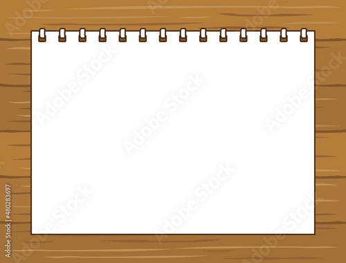 木のボードの上に置いてあるスケッチブックのイラスト