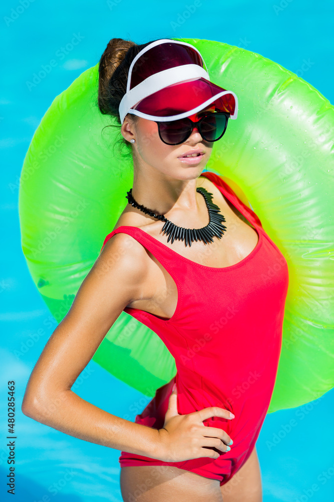 Sexy Tanned Woman In Red Swimsuit Having Fun And Enjoying Summer In Amazing Big Swimming Pool