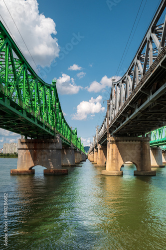 Hangang Railway bridges over the Han River rom underneath, Seoul, South Korea. Vertical view. photo