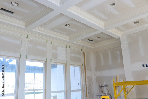 Foto New house under construction with finishing plastering drywall