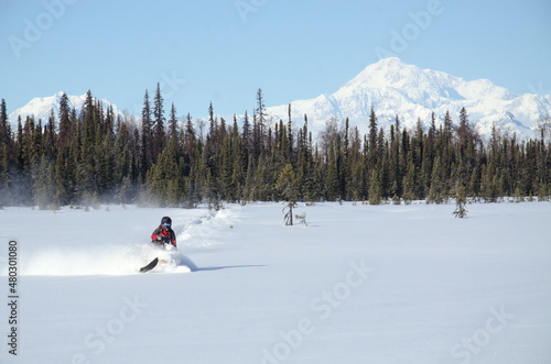 Snowmachine "sledder" rider in Alaska
