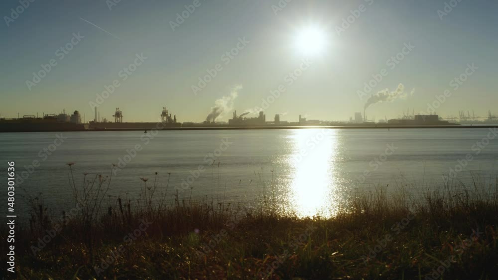 SUNNY WINTER AT THE BEACH IN ROTTERDAM, THE NETHERLANDS, TIMELAPSE BOAT