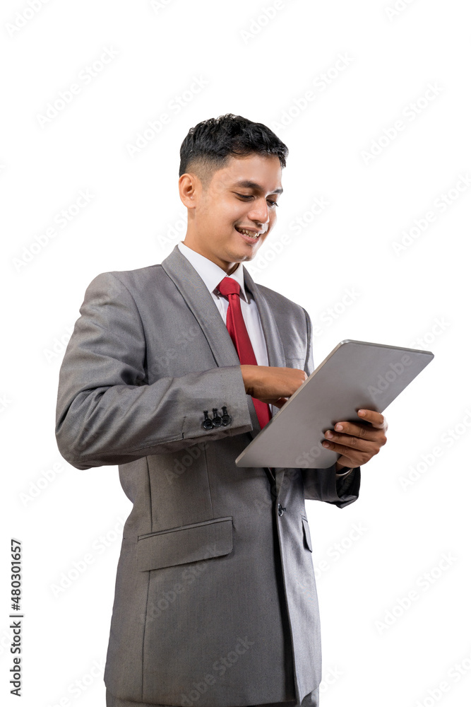 businessman holding tablet pc isolated over white background