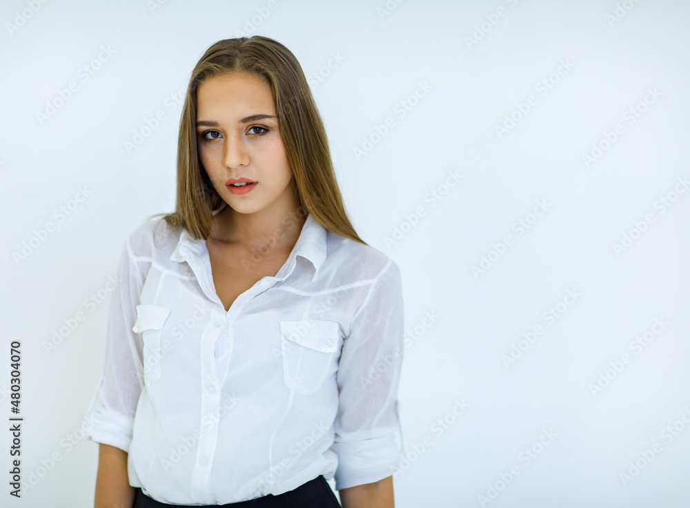 Portrait isolated studio cutout shot of Caucasian young beautiful long brunette hair female businesswoman employee in casual business outfit standing smiling look at camera posing on white background Portrait isolated studio cutout shot of Caucasian young beautiful long brunette hair female businesswoman employee in casual business outfit standing smiling look at camera posing on white background