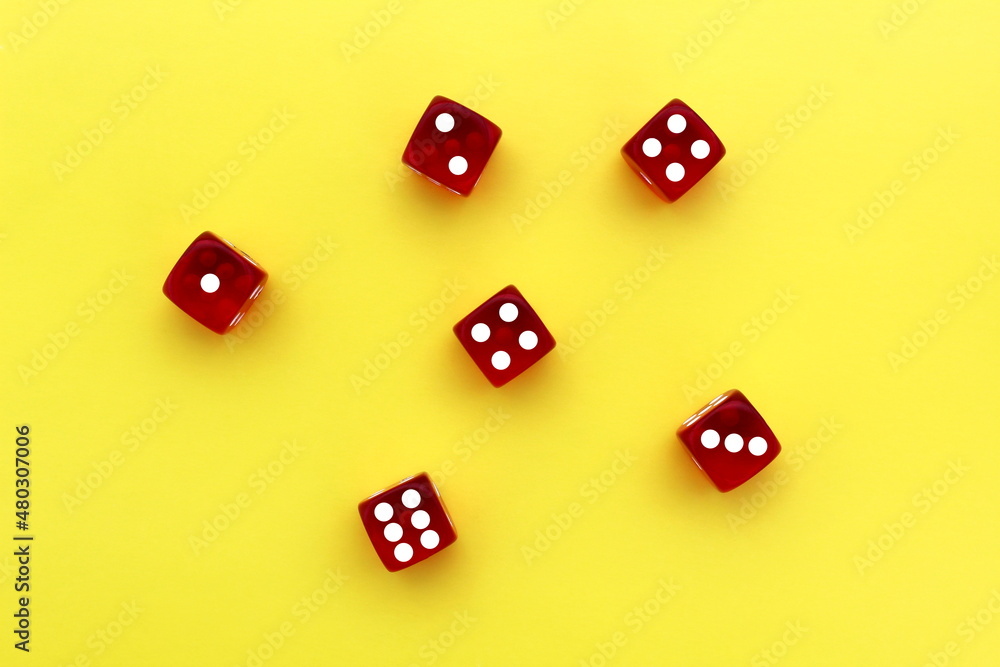 Six red dice lie on an isolated background. Six red dice lie on an isolated background.