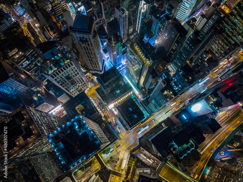 Aerial view of Hong Kong city at night © leungchopan