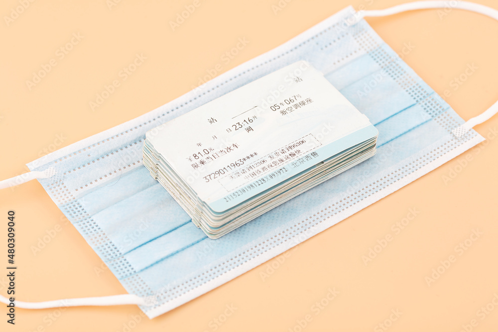 Obraz premium A stack of train tickets with masks