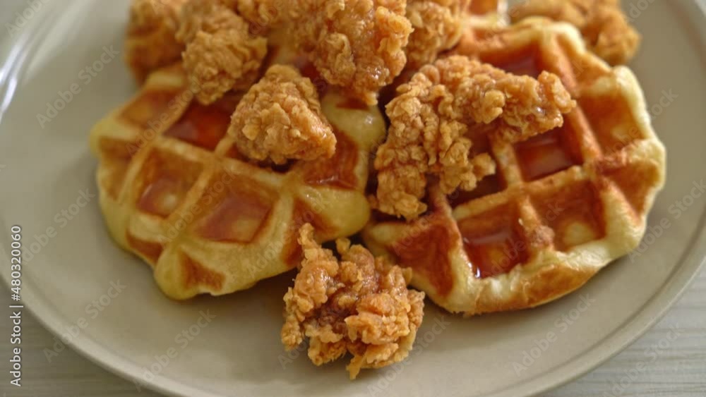 homemade fried chicken waffle with honey or maple syrup homemade fried chicken waffle with honey or maple syrup