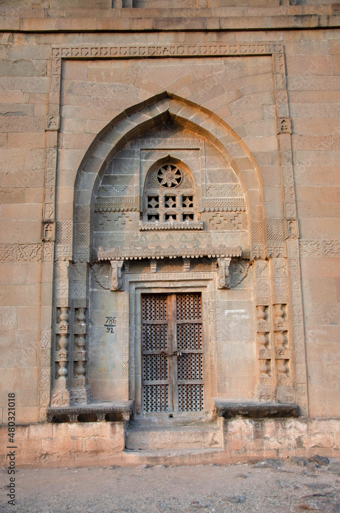 Entrance carved gate of Habashi Ghumat, Dargah Of Sath Peer Baba located in Junnar, near Pune, Maharashtra, India