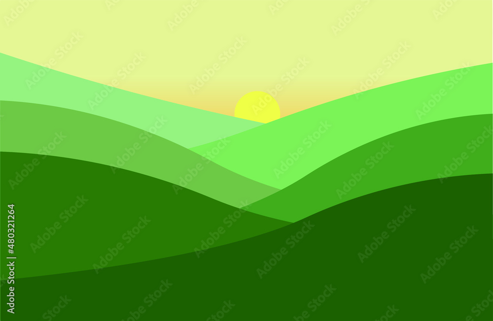 Landscape with grass and mountains during sunrise.