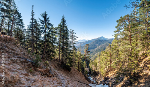 Herzogstand Hiking Path to blue sky with sun ray background