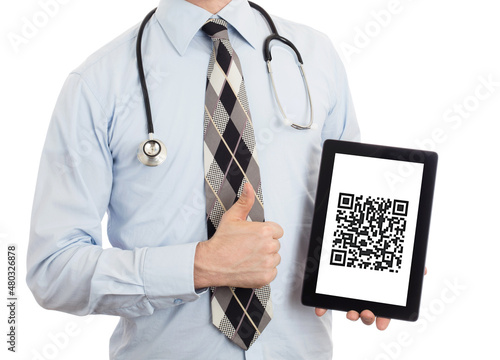 Doctor holding tablet - QR-code