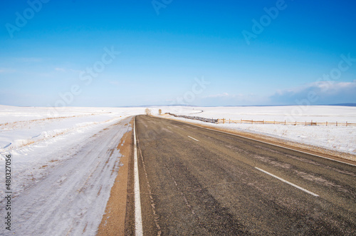 Automobile road on a winter sunny day. Family travel concept to ski resort. Winter or spring break.
